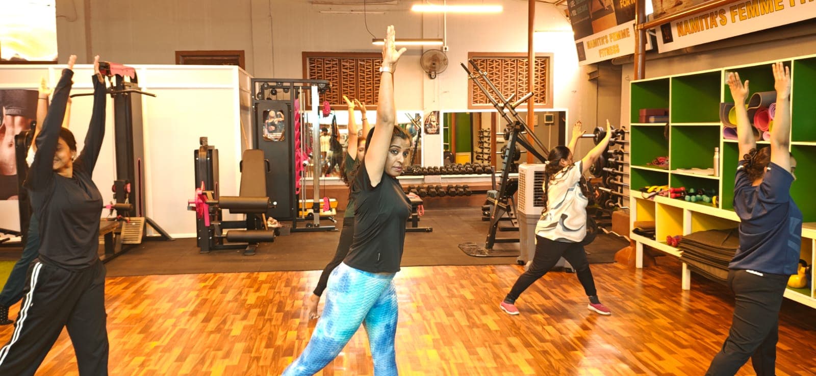 Women following a calm strength and mobility class.